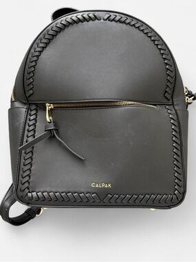 CALPAK Kaya faux leather round backpack